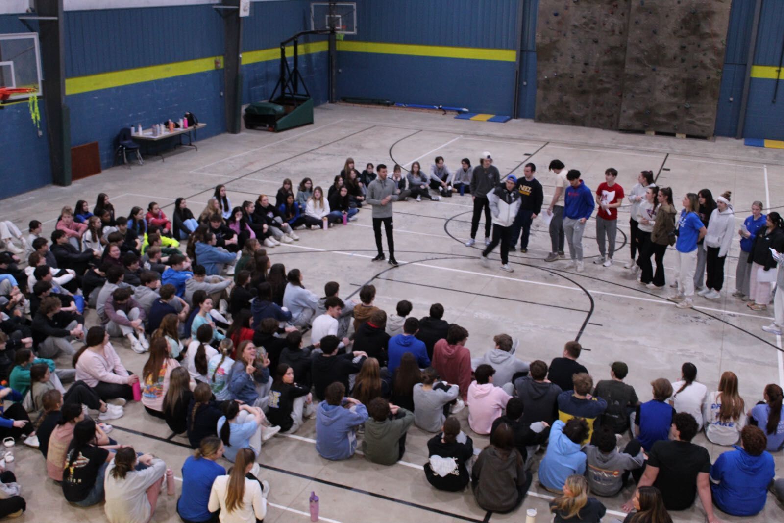 Students on retreat listening to a lecture